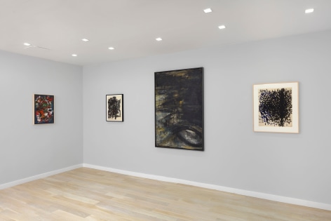 installation view of abstract paintings and drawings