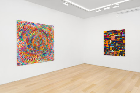 Installation view of abstract paintings