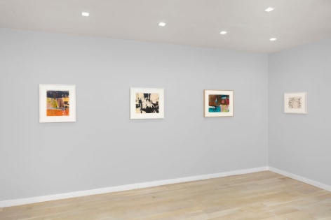 installation view of abstract paintings and drawings