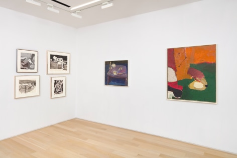 installation view of various framed artworks