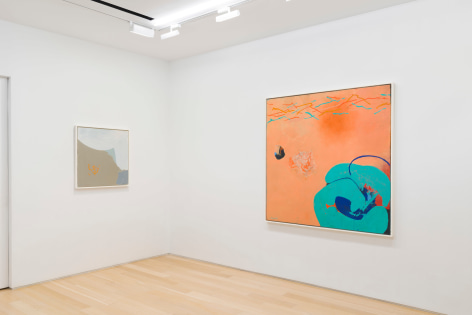 installation view of multiple paintings in a white room