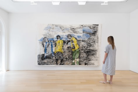 installation view of paintings in a white room