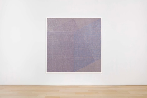 installation view of paintings in a white room