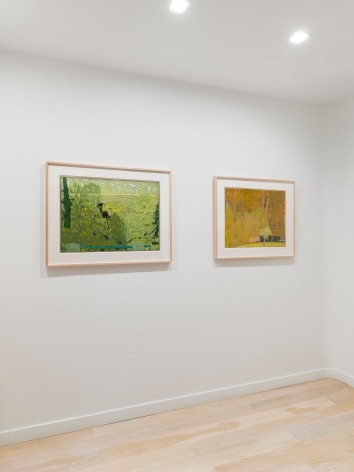 installation view of paintings in a white room