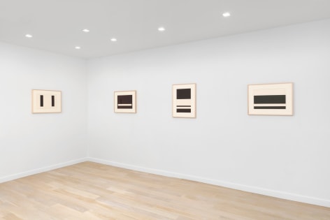 installation view of geometric abstract prints