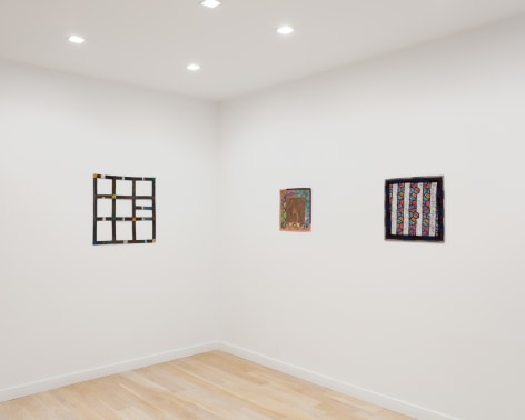 Installation view with multiple Alan Shields paintings