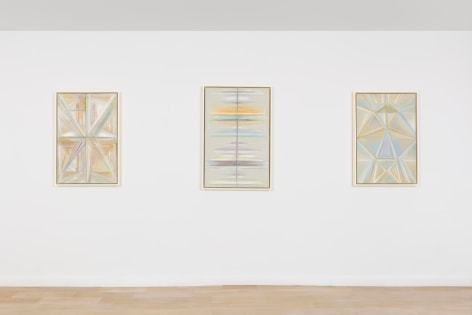 installation view of geometric abstract paintings