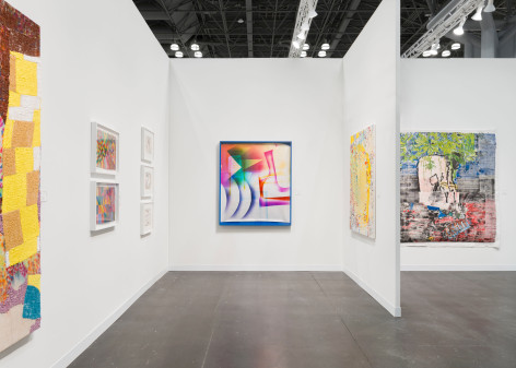 installation view with artworks in a white room