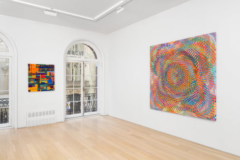 Installation view of abstract paintings