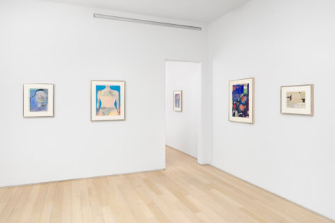 installation view with multiple framed works