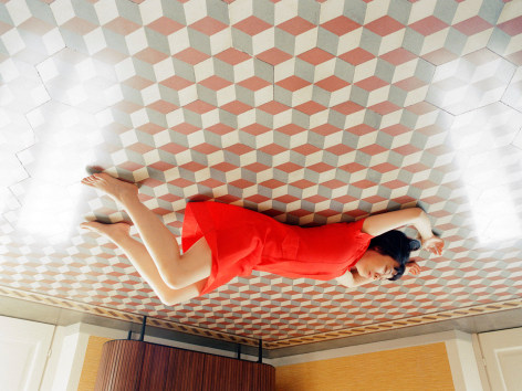 photo of a woman on a ceiling