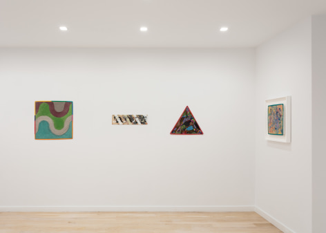 Installation view with multiple Alan Shields paintings