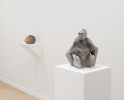 installation view of a white gallery with various sculptures