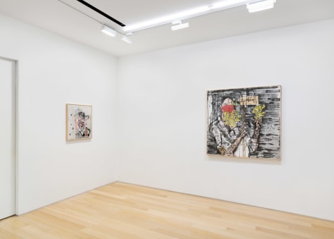 installation view of paintings in a white room