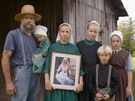 Lucas Foglia, Family Portrait with the Photograph George Took of Christina Before They Were Married, Tennessee, 2008