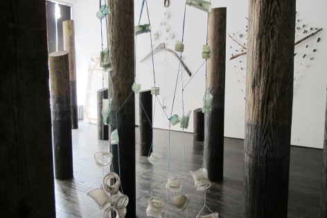 Installation view of forest-like sculptures