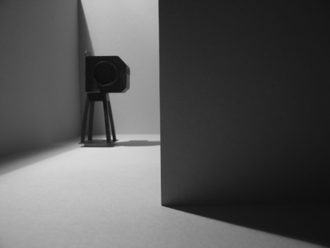 Gallery view of black sculpture in corner