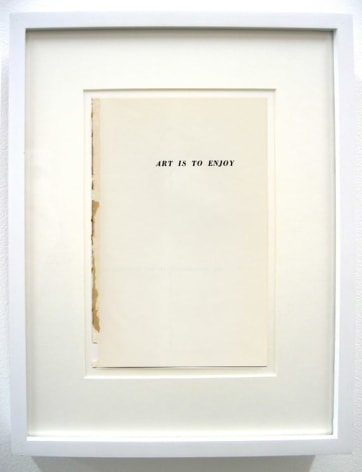 Framed cover, reading 'art is to enjoy'