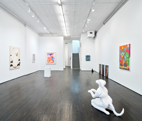 Gallery view of painting and sculptures related to dogs