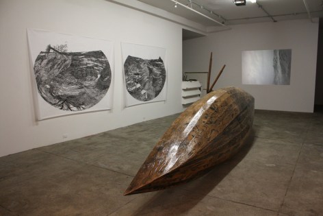 Wooden boat on gallery floor