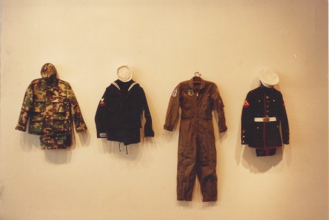 Military clothing on gallery wall