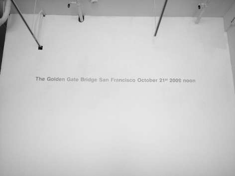gallery wall text reading 'the golden gate bridge san francisco october 21st 2009 noon.'