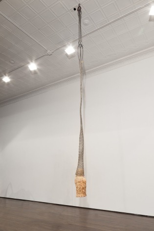 Individual view of Jeff Williams sculpture hanging from gallery ceiling