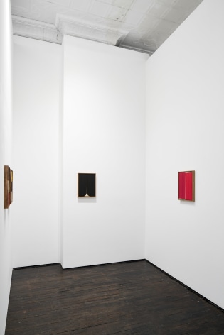 Gallery installation view of small abstract paintings