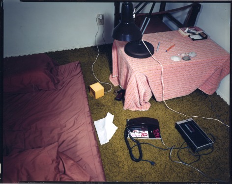 floor with telephone and magazines
