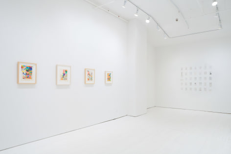 Installation view colorful drawings and pencil drawings