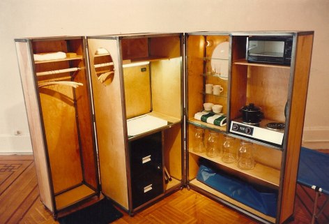 Foldable wood kitchen, with closet and storage space.
