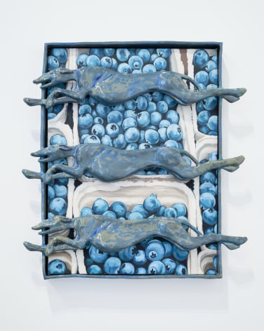 Painting of blueberries covered in glazed stoneware sculptural frame featuring dogs running