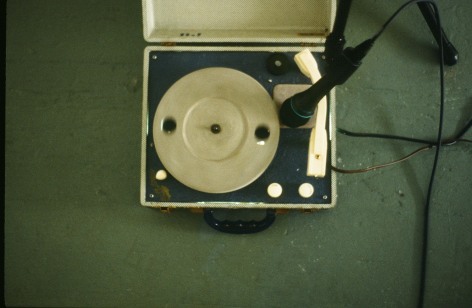 record player with microphone on gallery floor
