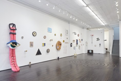 Installation view of small and varied works related to time