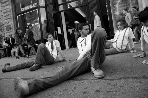 Liz Magic Laser video still from Distressed 10 minute video. Dancers shown on the ground distressing their jeans.