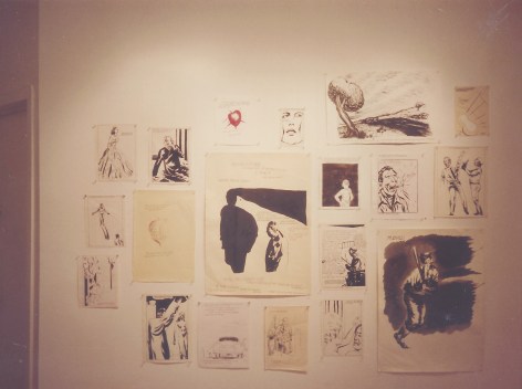 black and white drawings on gallery wall