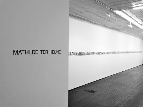Black and White installation photo with artist's name as wall text