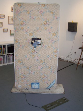 Upright mattress on gallery floor