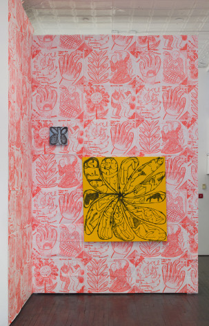 Corner gallery view with risograph prints and paintings