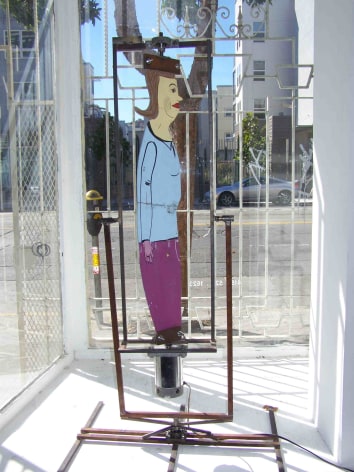 Chris Johanson cutout figure mounted on Spelletich sculpture