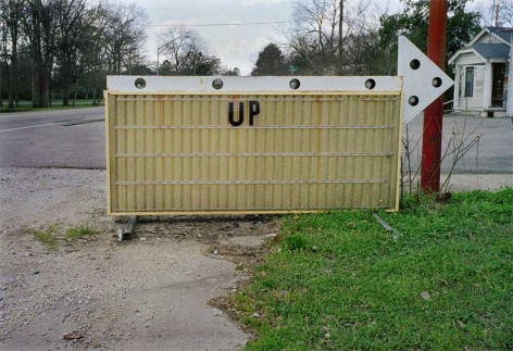 Photo of motel marque reading 'up'