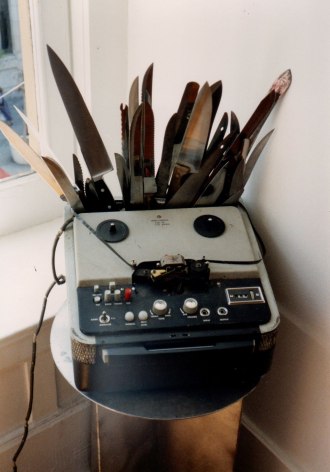 Tape deck with knives attached
