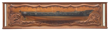 A Cased Half-Model with Elaborately carved Back Board of the USS  Quinnebaug made at the Philadelphia Navy Yard Dated 1878