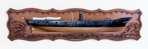 A Cased Half-Model with Elaborately carved Back Board of the USS  Quinnebaug made at the Philadelphia Navy Yard dated 1878