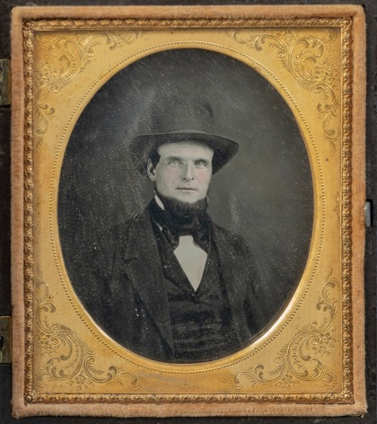 Sixth Plate Daguerreotype of a Fireman Seated with Tall Hat.