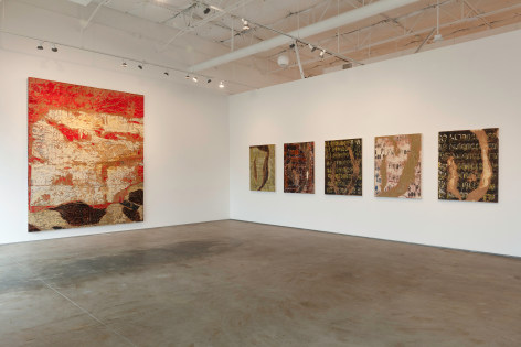 Installation view of one large Edgar Ramirez painting and five (Smoke) Remnant paintings in various colors