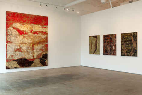 Installation view of one large Edgar Ramirez painting and three (Smoke) Remnant paintings in various colors
