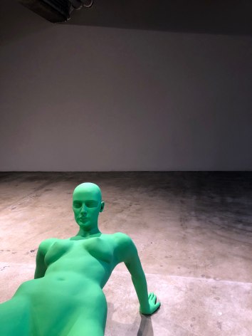 Description: standalone green female mannequin