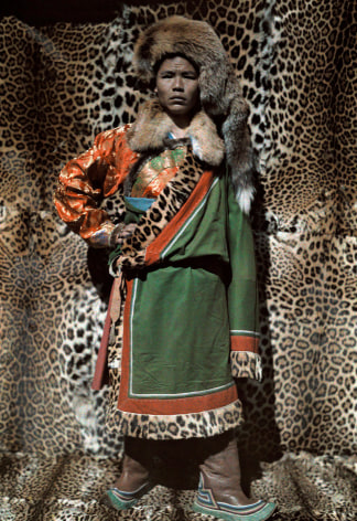 Joseph F Rock- A Nashi Man Stands in Front of Robes Made from Leopard Skin