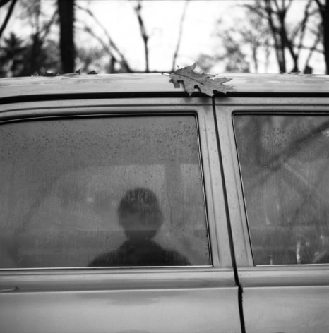Vivian Maier- Self-Portrait (Car Window Reflection with Leaf)